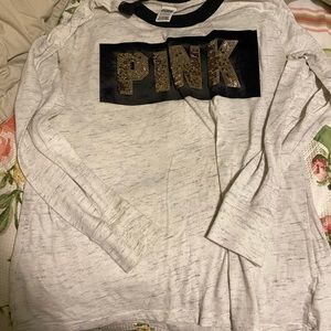 Small long sleeve shirt.